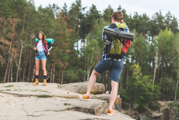 Man and Lady Hiking in Shorts