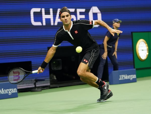 Roger Federer US Open 2019 Wearing Black and White Uniqlo wear and Nike Shoes Black and White.