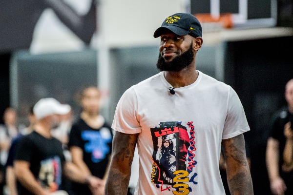 NBA star LeBron James of Los Angeles Lakers shows his basketball skills during his China tour in Shanghai, China, 25 August 2018.