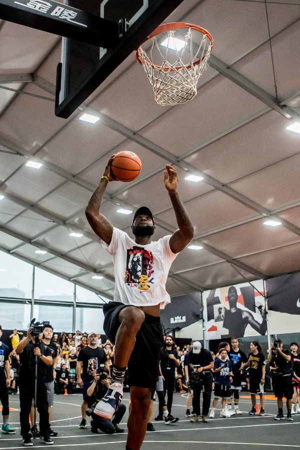 NBA star LeBron James of Los Angeles Lakers shows his basketball skills during his China tour in Shanghai, China, 25 August 2018.