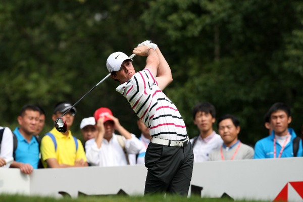 Golfer Rory McIlroy of Northern Ireland plays a shot in the first round match of the HSBC Champions golf tournament in Shanghai, China, 31 October 2013. 