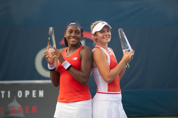 Coco Gauff (USA) and Caty McNally (USA) celebrate their doubles championship at the Citi Open tennis tournament on August 3, 2019 in Washington DC