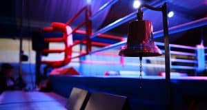 Empty boxing ring and bell