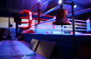 Empty boxing ring and bell