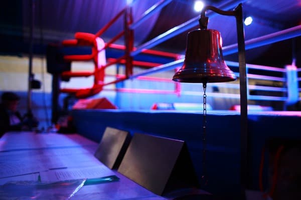 Empty boxing ring and bell 