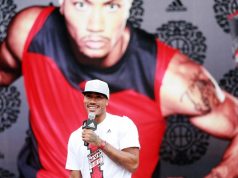 NBA star Derrick Rose of the Chicago Bulls speaks at a meeting with fans during his China tour in Shanghai, China, 23 August 2011