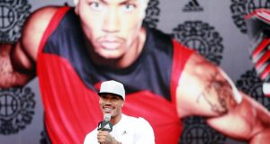 NBA star Derrick Rose of the Chicago Bulls speaks at a meeting with fans during his China tour in Shanghai, China, 23 August 2011